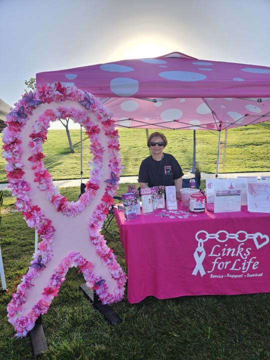 Stana Bright - Links for Life booth.jpg