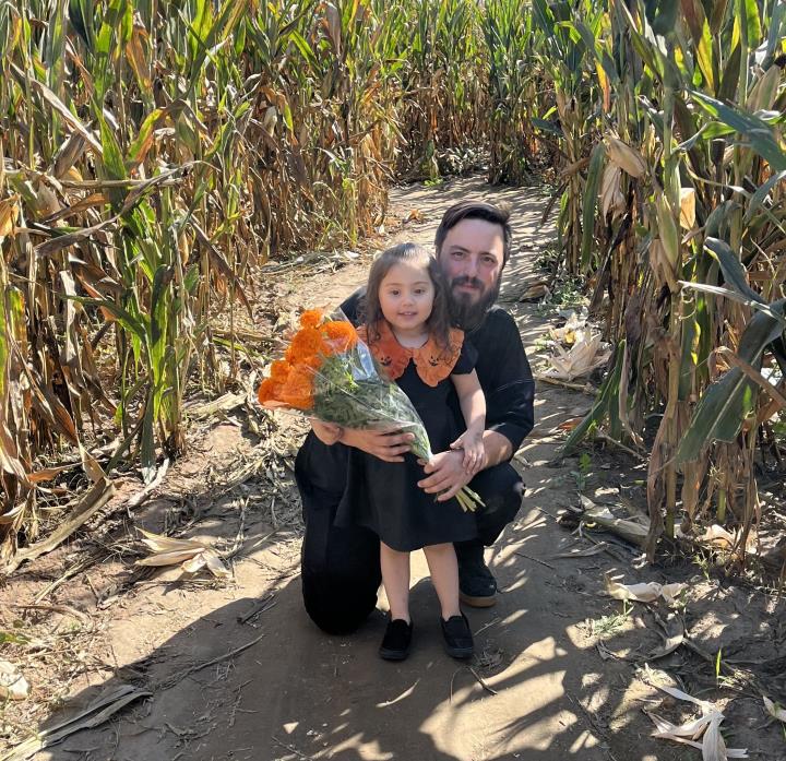 James with daughter Luna.CROPPED.jpg