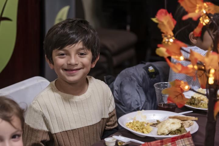 TMKC.Thanksgiving meal.Kidenjoys meal.jpg